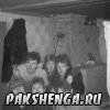 Возле печки.